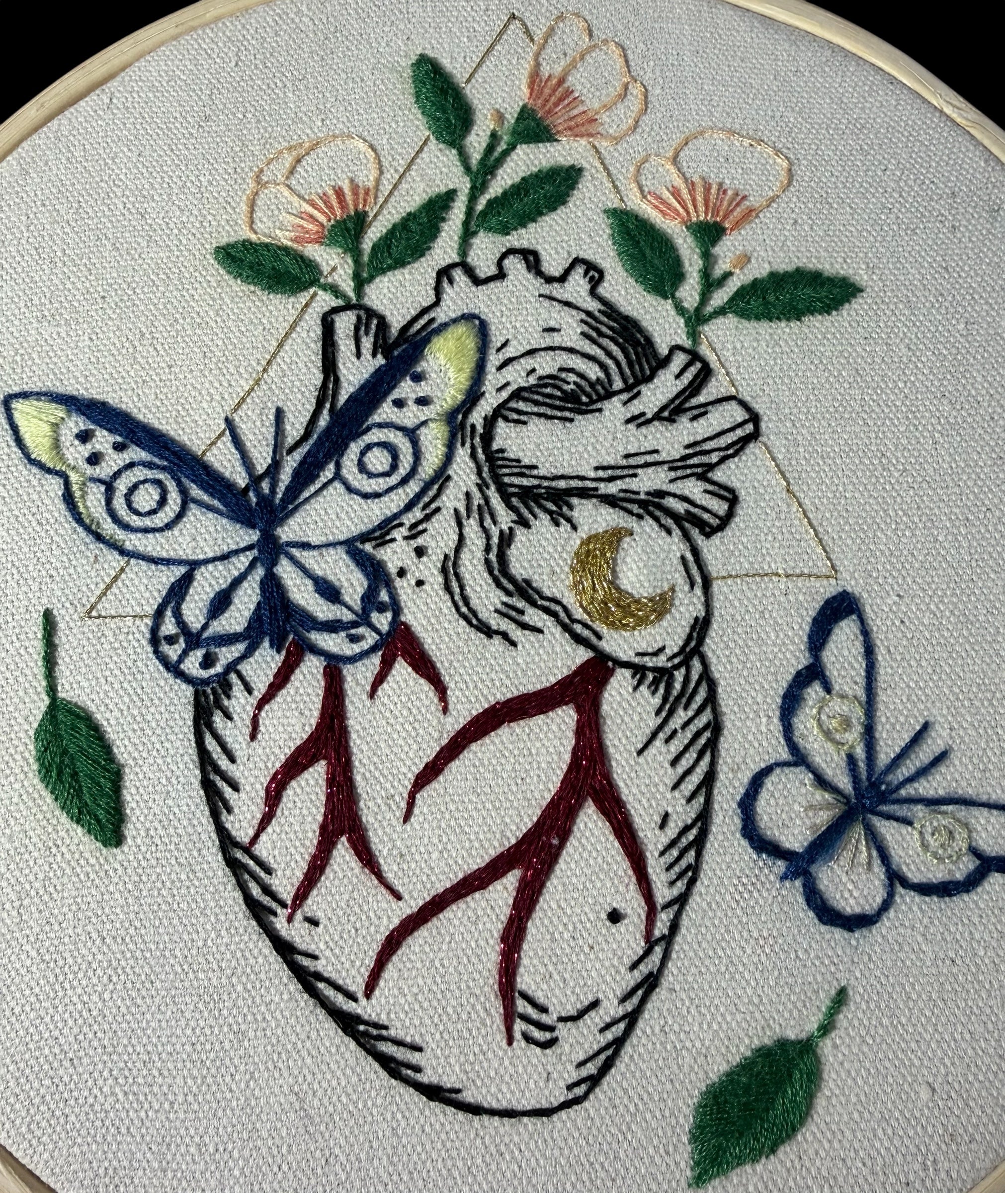 Where moths gather, strange hearts bloom.